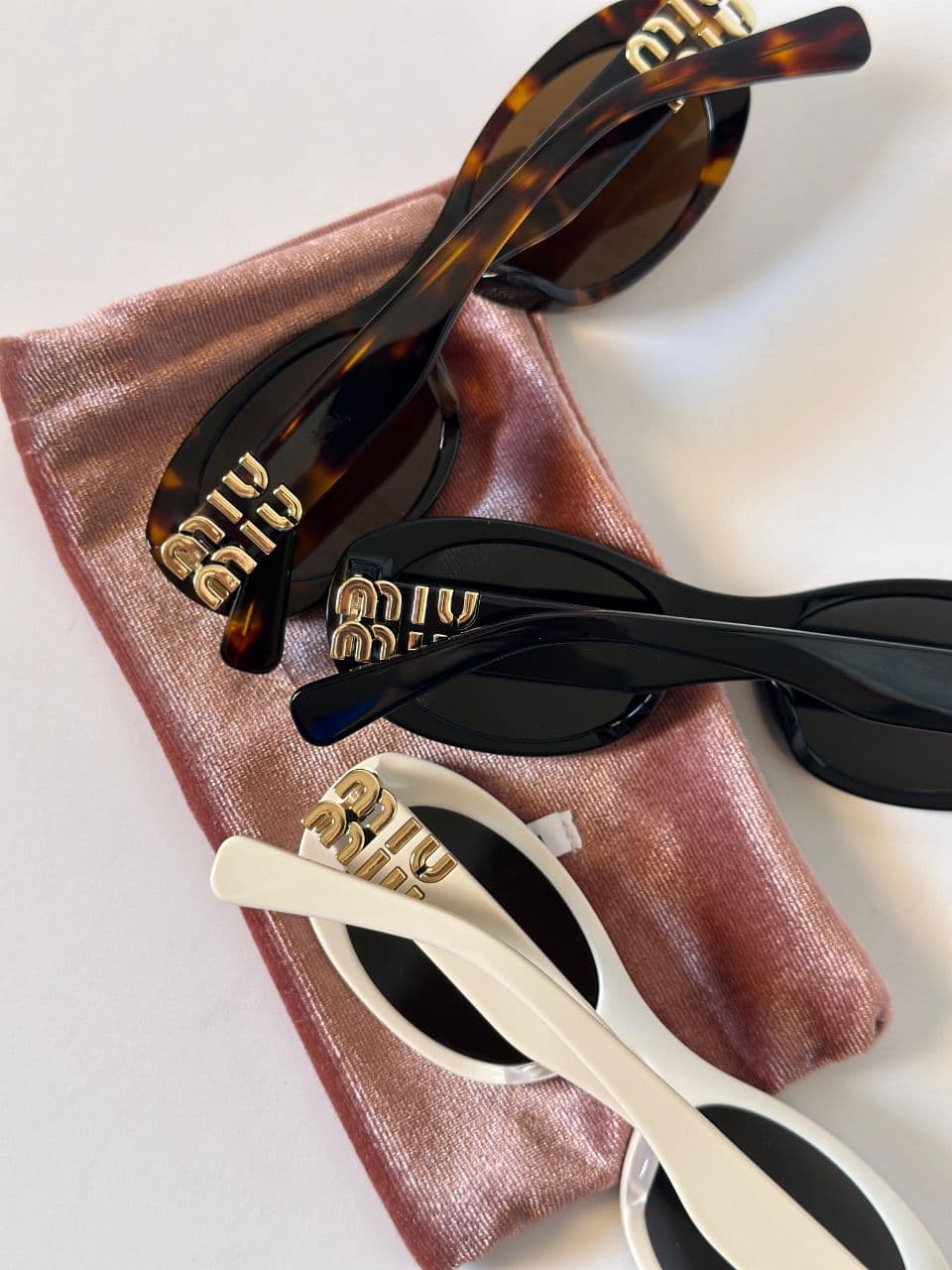 Miu Miu Oval Frame Logo Sunglasses