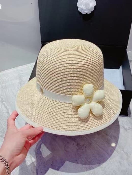 Chanel Women's Straw Hat with Flower Accent