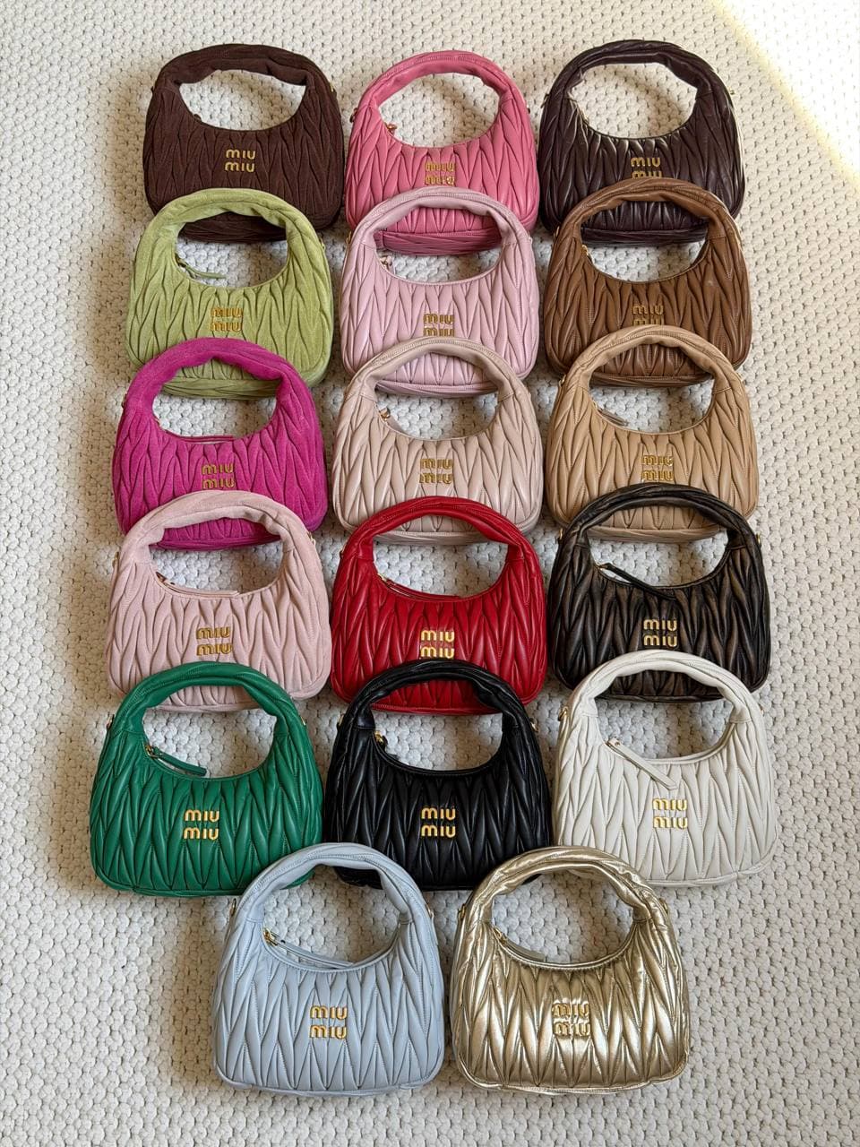 Miu Miu Wander Matelassé Mini Hobo Bag in Nappa Leather