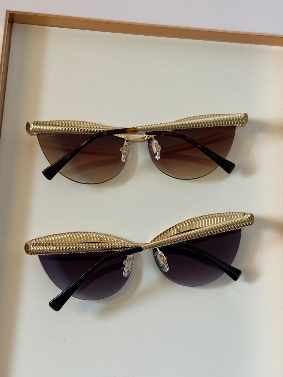 BVLGARI Serpenti-Inspired Cat-Eye Sunglasses with Sculpted Gold Coil Design