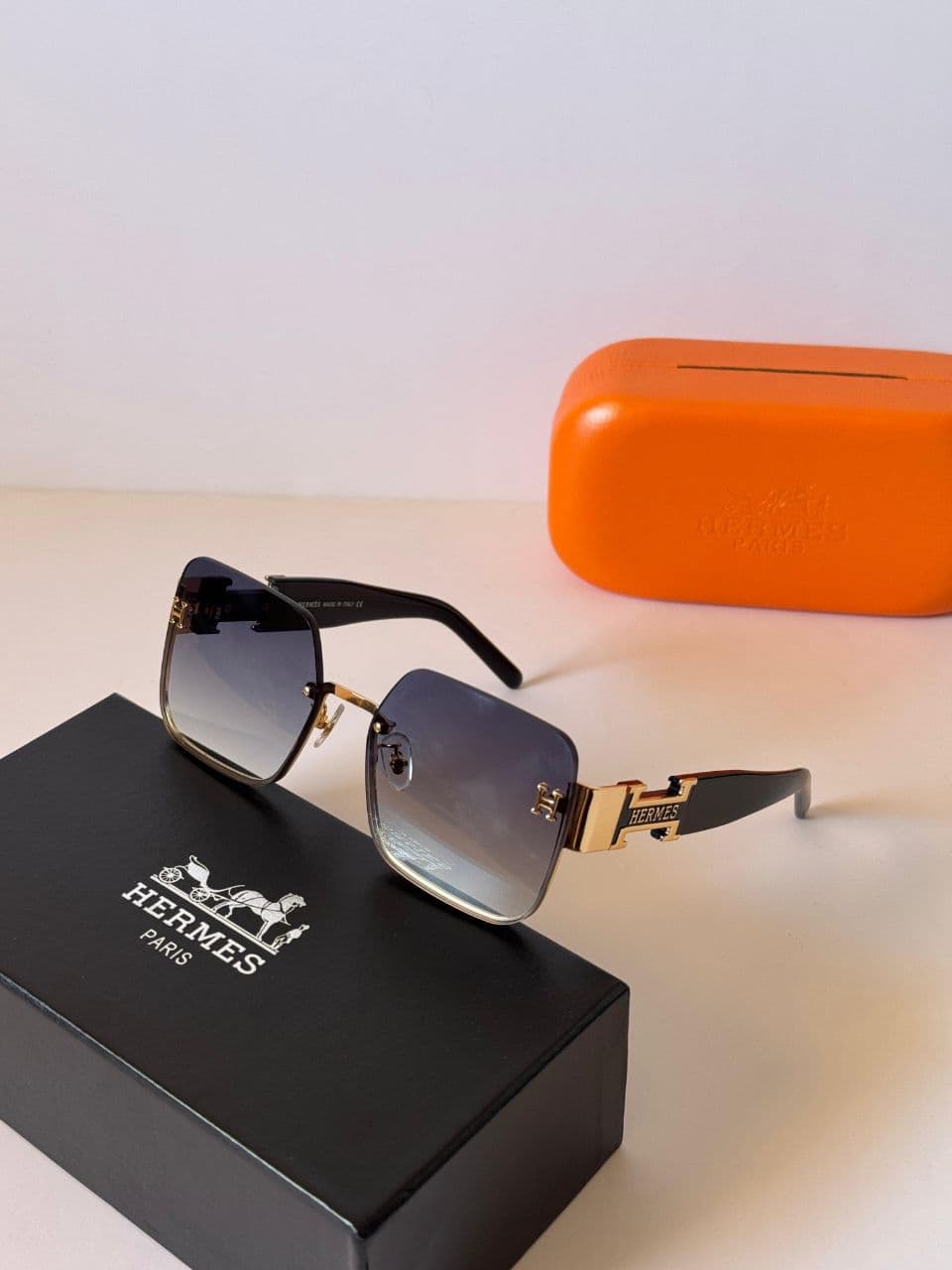 Hermès Rectangular Rimless Sunglasses with Iconic H-Temple Detail