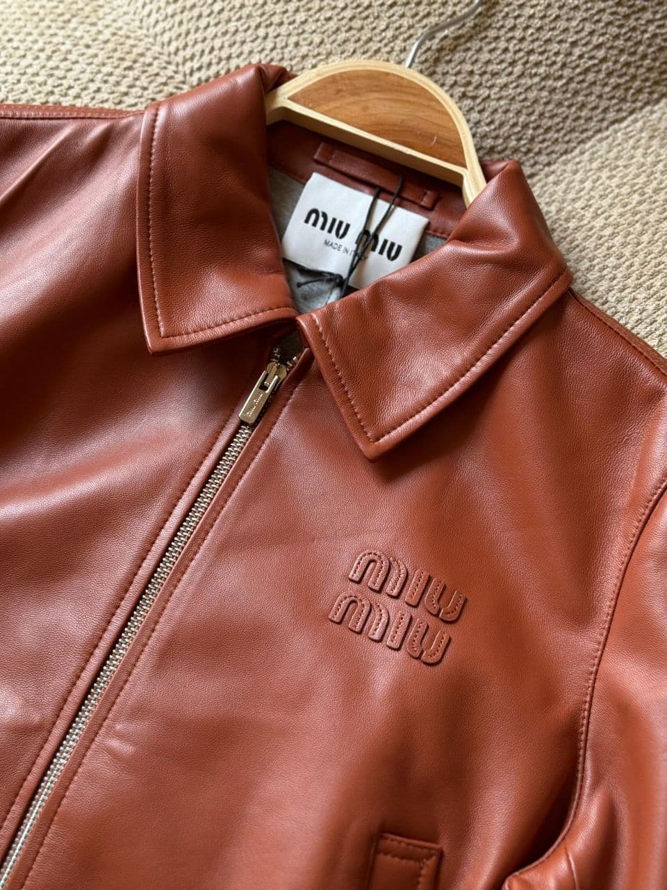 Miu Miu Cropped Leather Jacket with Signature Logo Detail