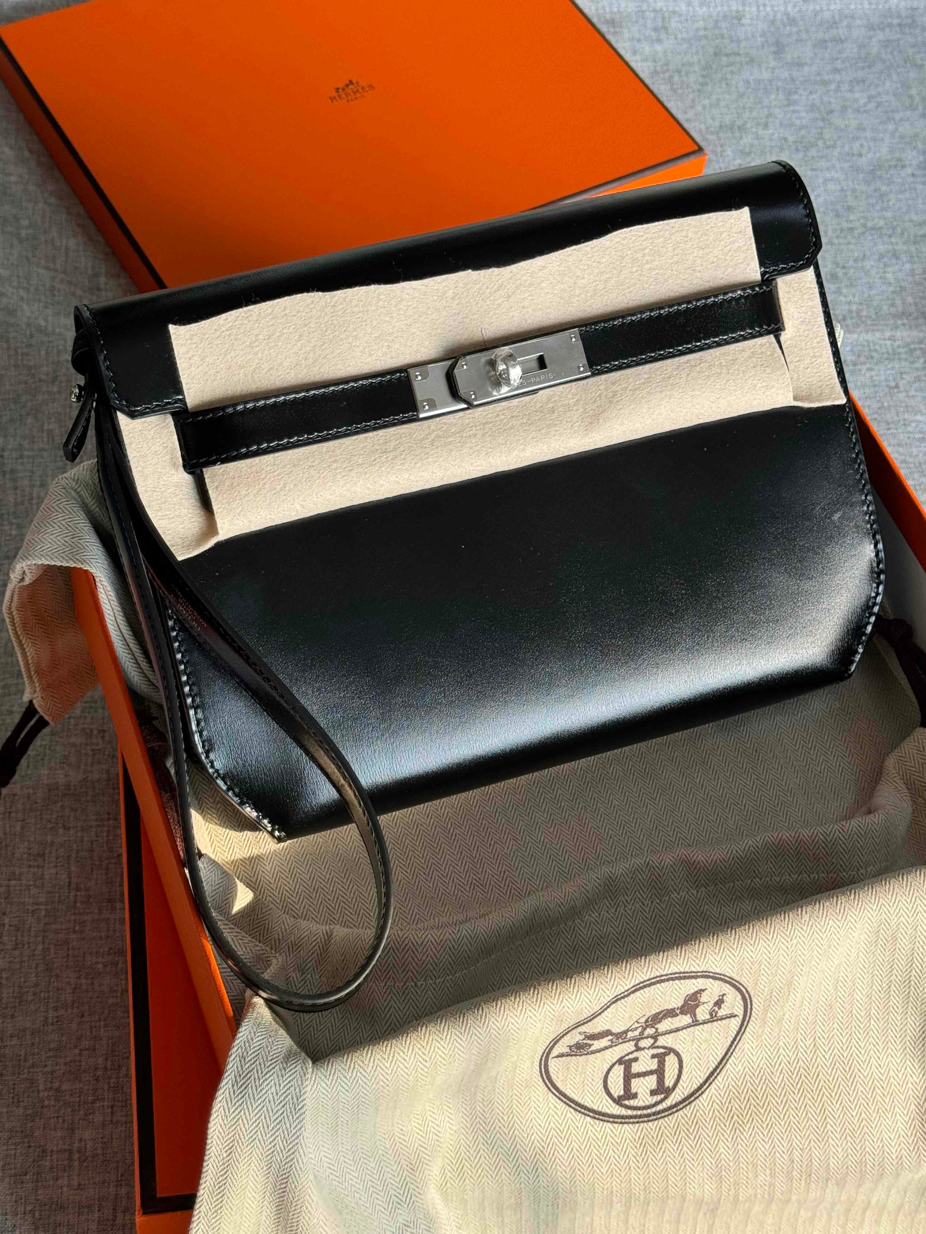 Hermès Kelly Depeche Box Calf – Heritage Brilliance in Motion
