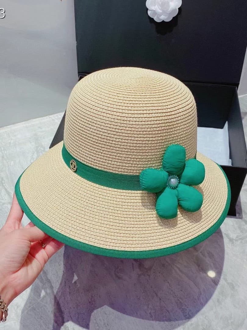 Chanel Women's Straw Hat with Flower Accent
