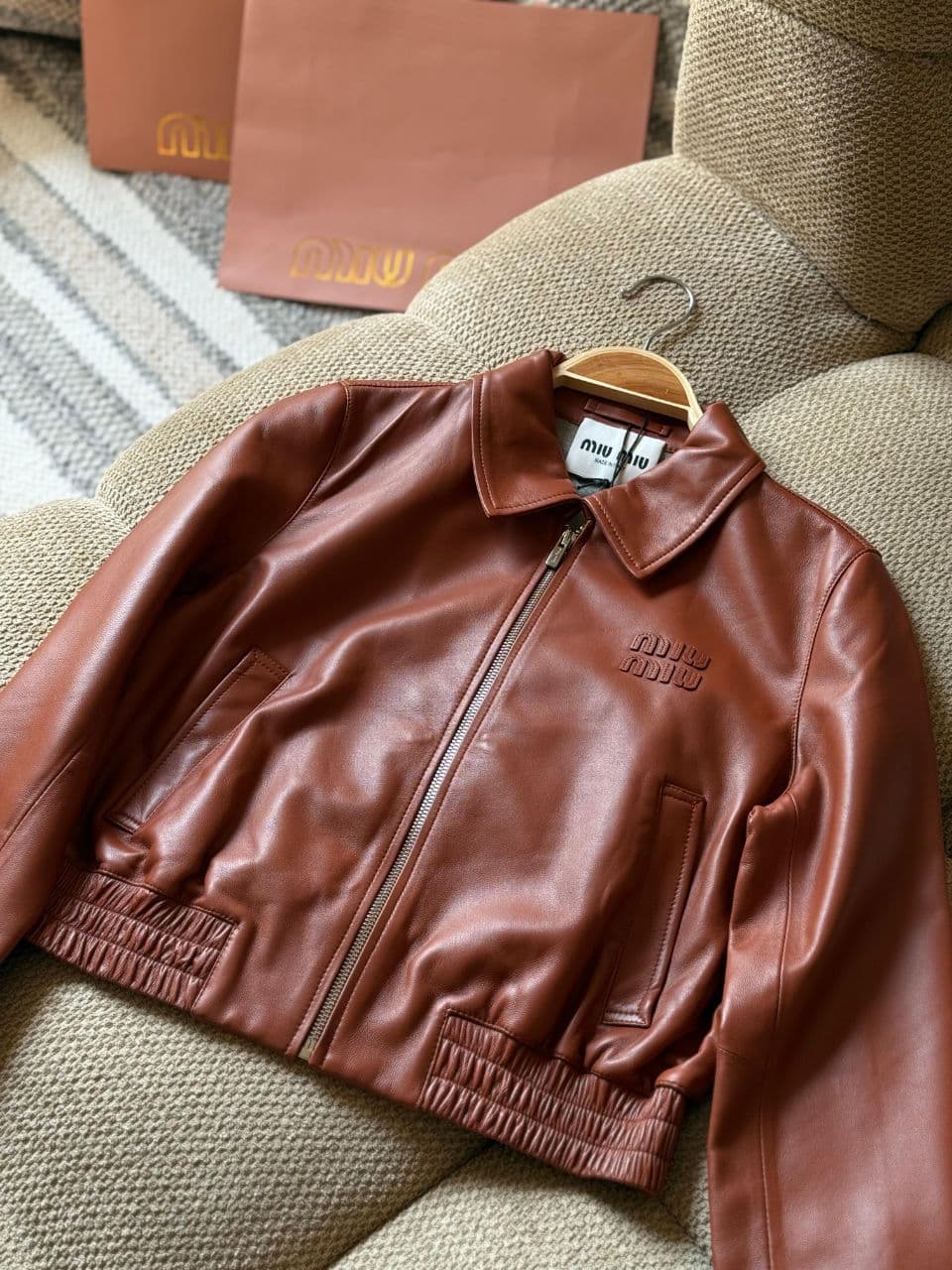 Miu Miu Cropped Leather Jacket with Signature Logo Detail