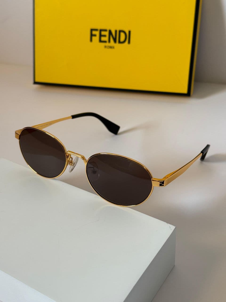 Fendi Oval Metal Sunglasses with Slim Temple Design