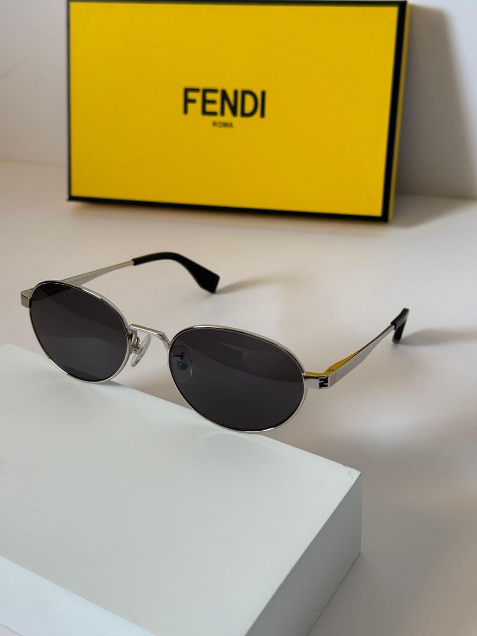 Fendi Oval Metal Sunglasses with Slim Temple Design