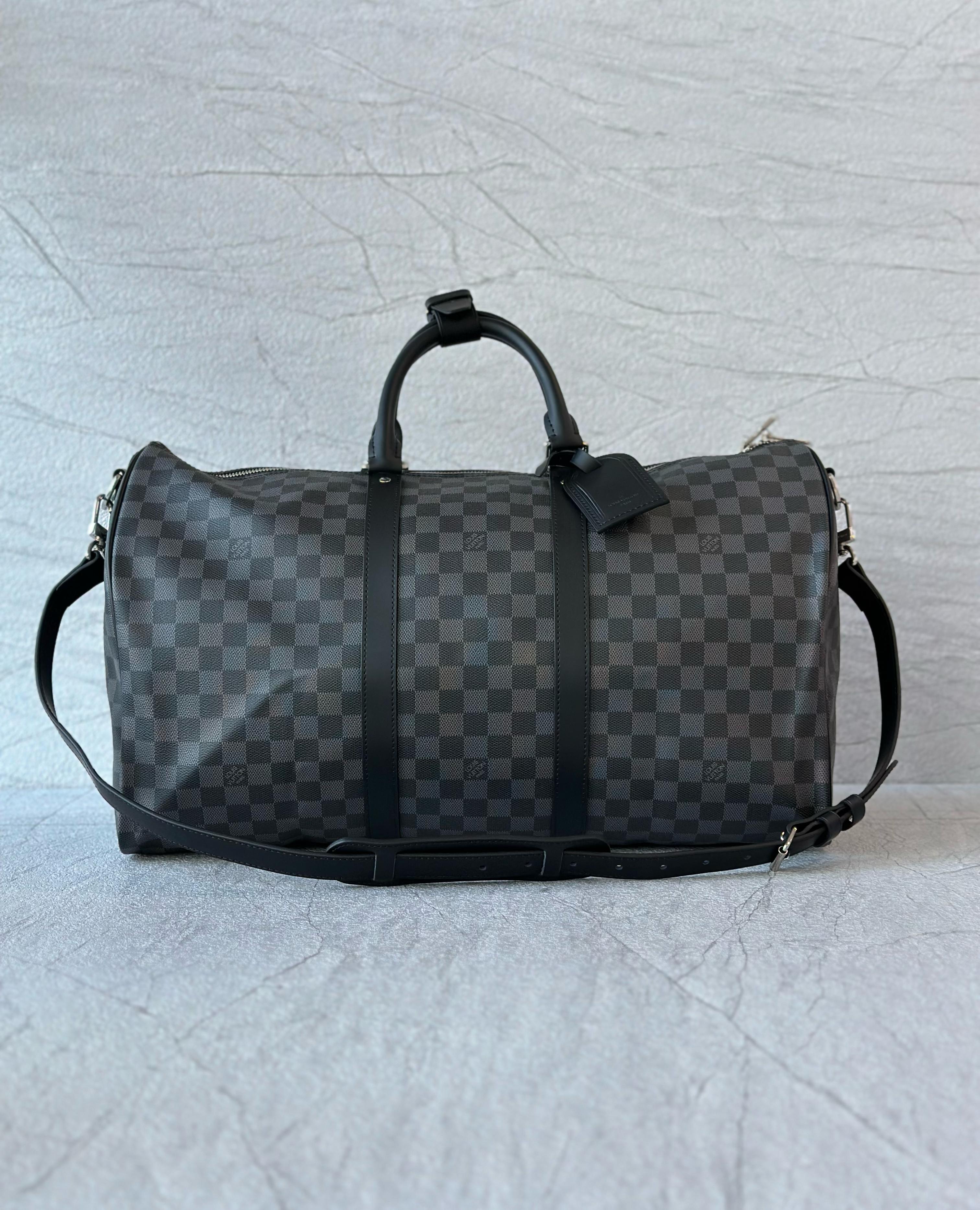 Louis Vuitton Keepall Bandoulière travel bag