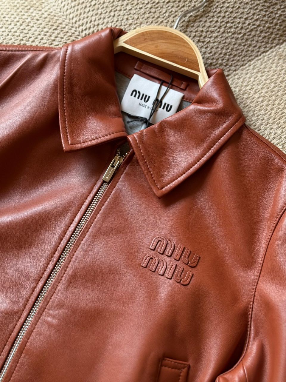 Miu Miu Cropped Leather Jacket with Signature Logo Detail