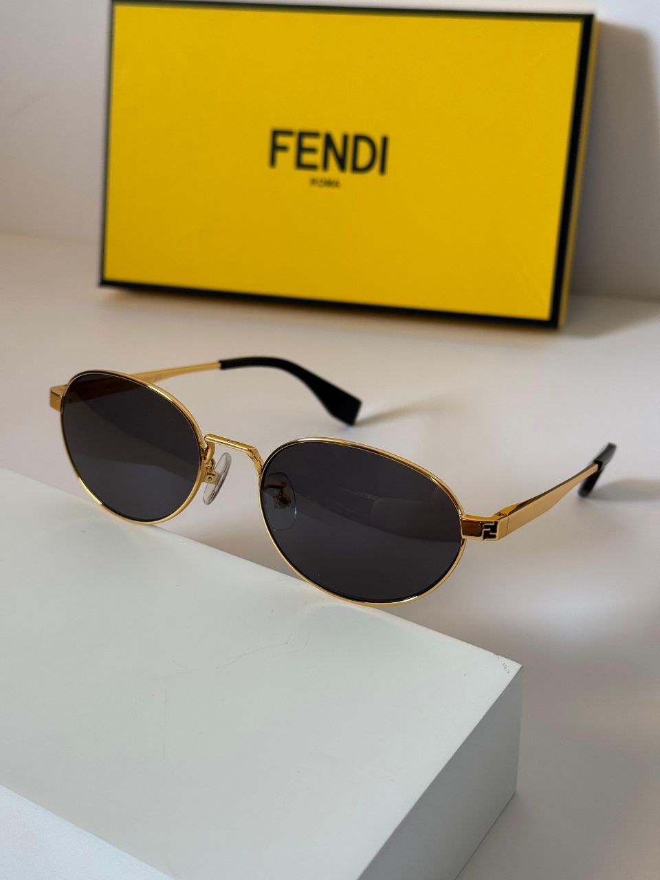 Fendi Oval Metal Sunglasses with Slim Temple Design