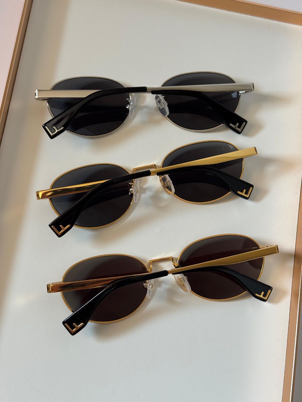 Fendi Oval Metal Sunglasses with Slim Temple Design