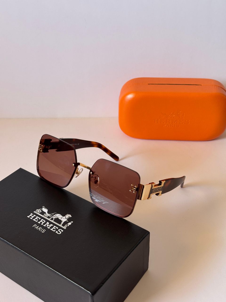 Hermès Rectangular Rimless Sunglasses with Iconic H-Temple Detail