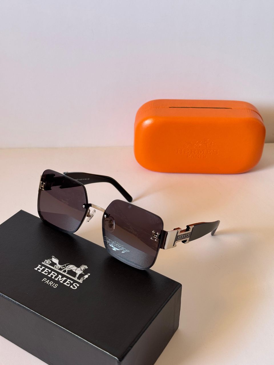 Hermès Rectangular Rimless Sunglasses with Iconic H-Temple Detail