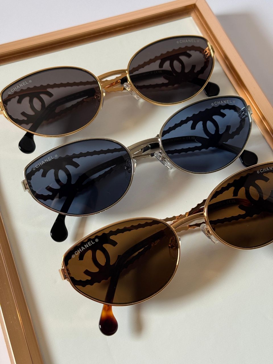 CHANEL Oval Sunglasses with Iconic CC Chain Temple Design