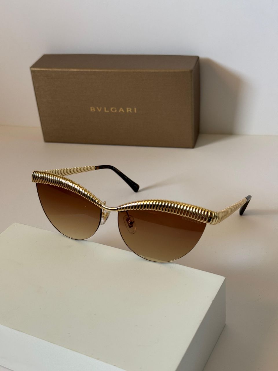 BVLGARI Serpenti-Inspired Cat-Eye Sunglasses with Sculpted Gold Coil Design
