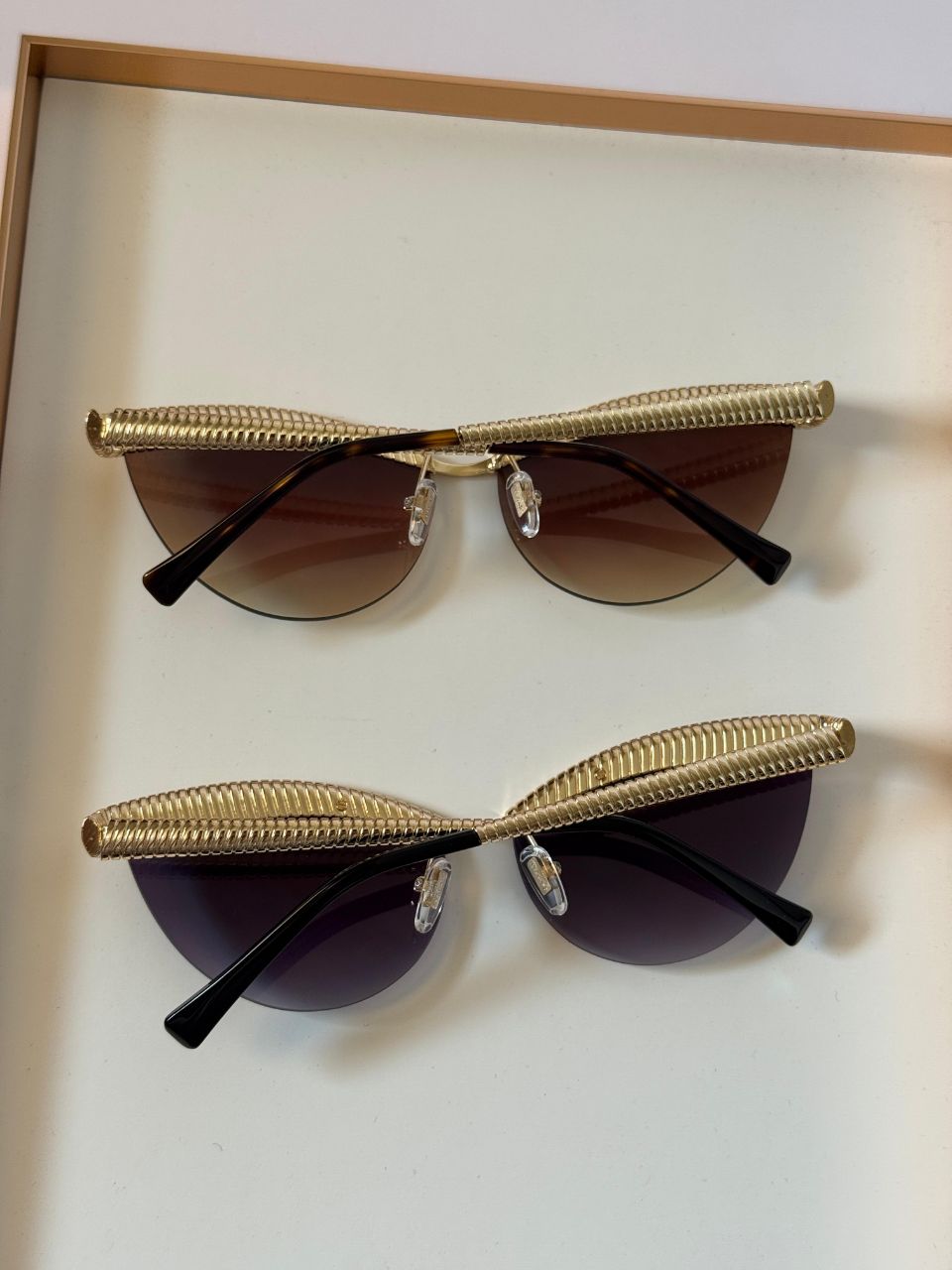 BVLGARI Serpenti-Inspired Cat-Eye Sunglasses with Sculpted Gold Coil Design