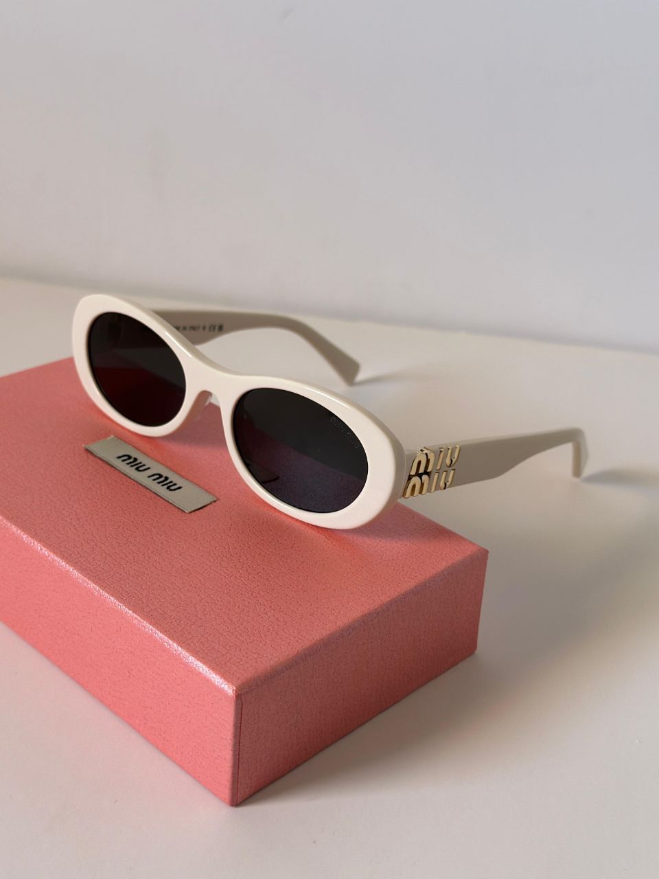 Miu Miu Oval Frame Logo Sunglasses